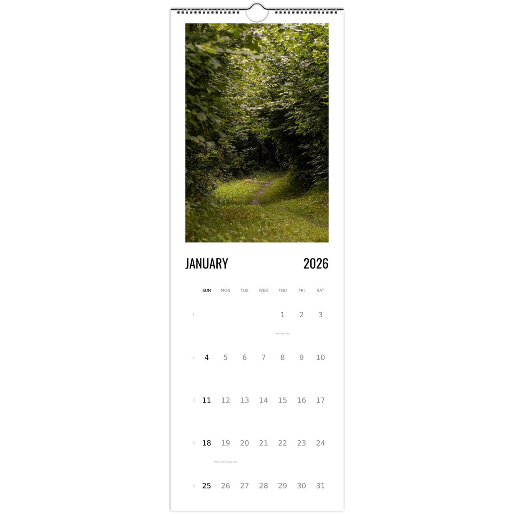 Swiss forest calendar shown in a styled room