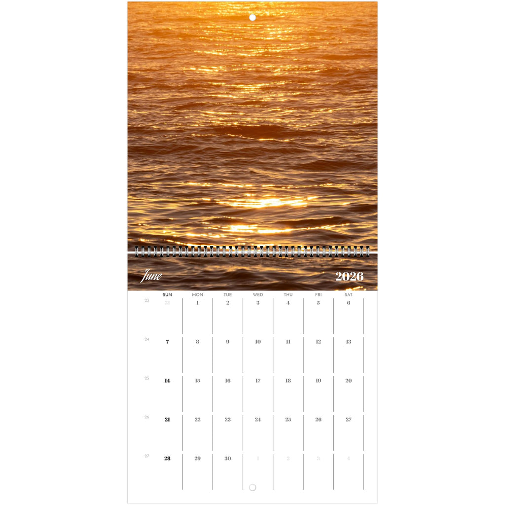Wave photography calendar showing a monthly spread