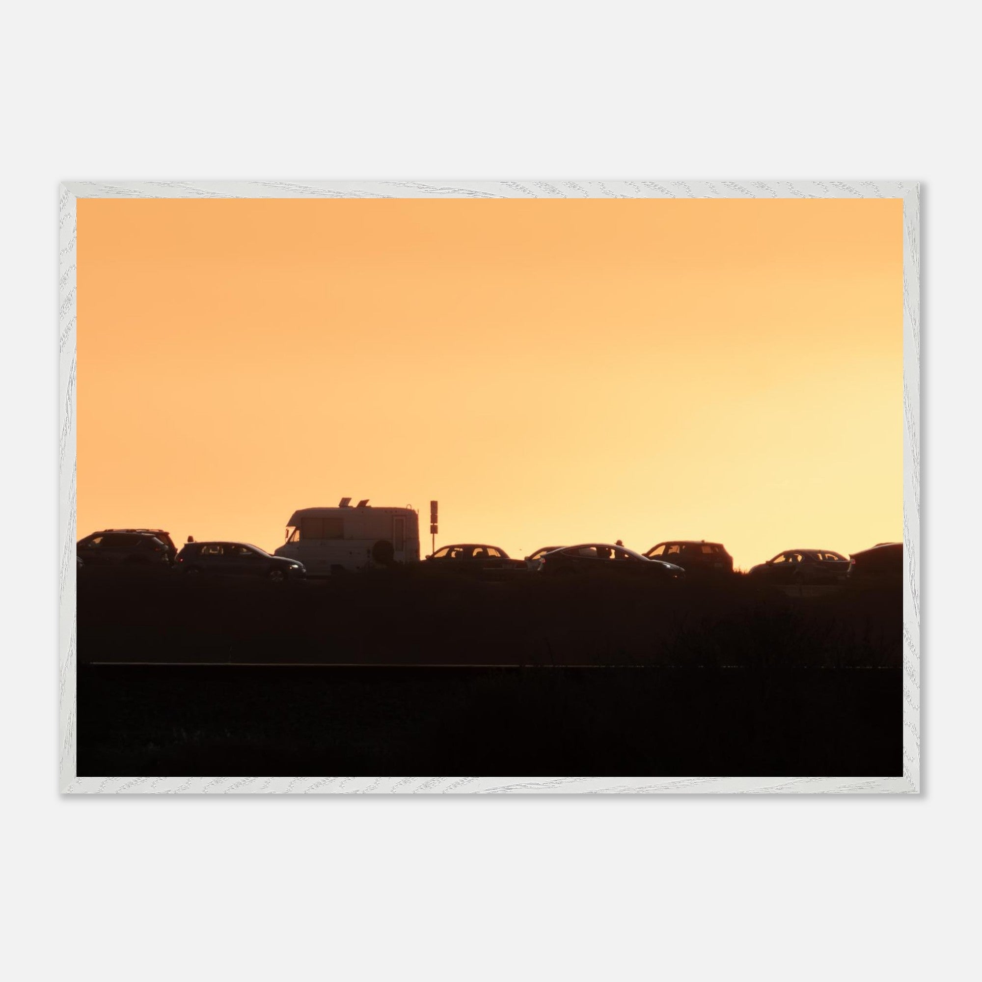 Coastal highway photography wall art in a styled room